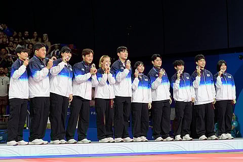 Team of South Korea, silver medalist in judo mixed team competition
